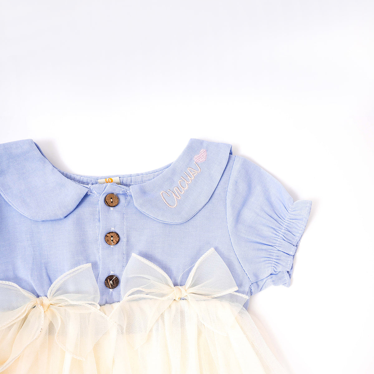 Bows and Buttons in Creamy Circus