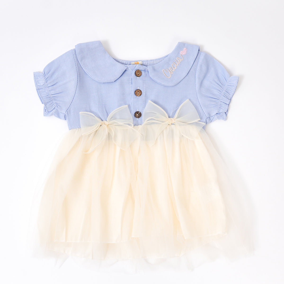 Bows and Buttons in Creamy Circus